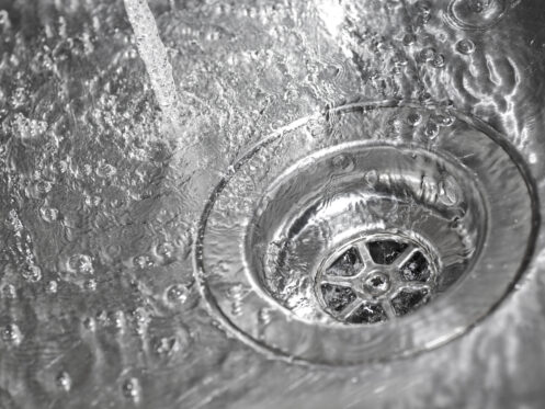 water running down a drain